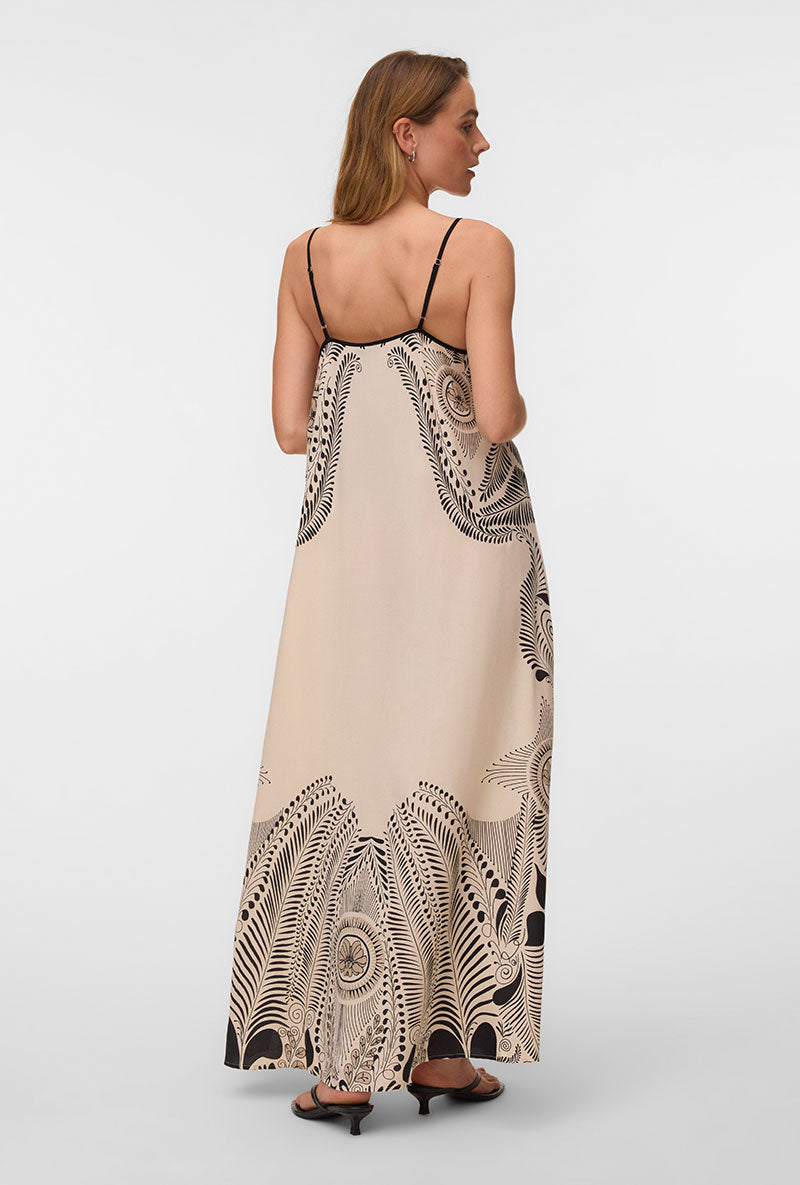 Back image of a model wearing Lalita zola ankle dress in beige, by brand Vero moda