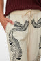 Front image of a model wearing the Lalita zola hw wide pant in beige, by brand Vero moda