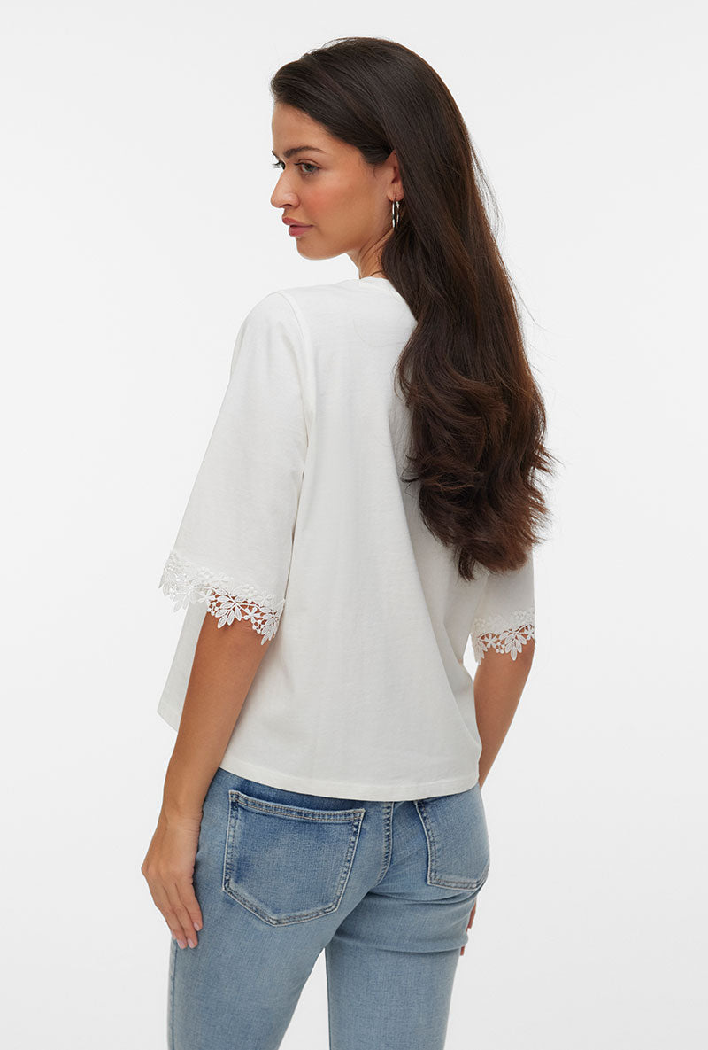 Back image of a model wearing Lyla ss oneck top in white, by brand Vero moda