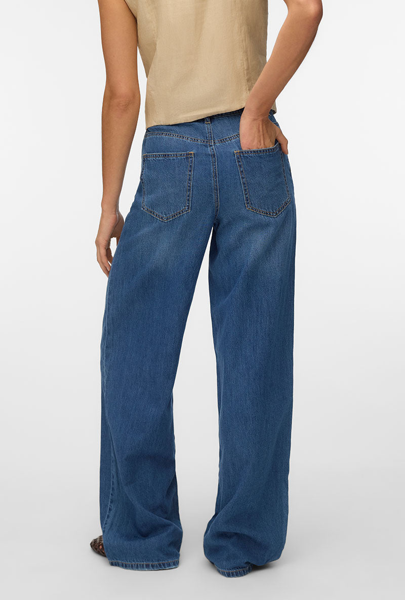 Back image of a model wearing Rae hw wide jeans in denim, by brand Vero moda