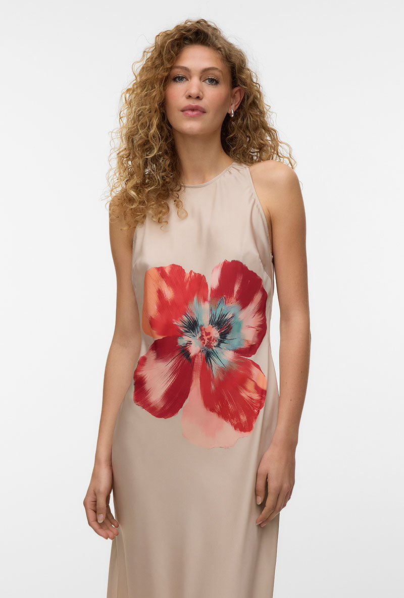 Front image of a model wearing Reba hibisca ankle dress in beige, by brand Vero moda