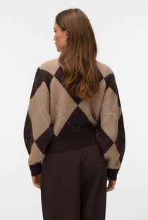 Back image of a model wearing the Darla ls rollneck pullover in chocolate, by brand Vero moda