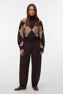 Front image of a model wearing the Darla ls rollneck pullover in chocolate, by brand Vero moda
