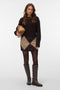Front image of a model wearing the Darla nw short skirt in chocolate, by brand Vero moda