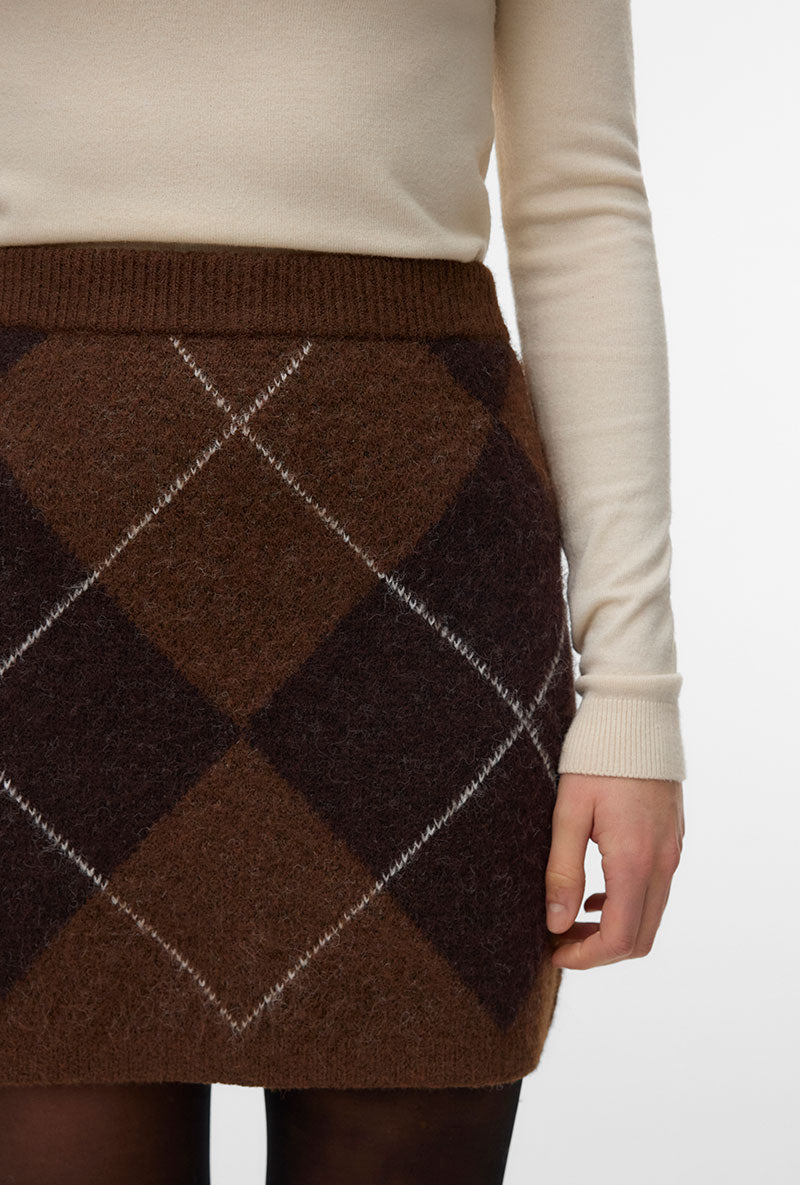 Front image of a model wearing Darla nw short skirt in brown, by brand Vero moda