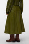 Back image of a model wearing the Dash hw coated skirt in green, by brand Vero moda