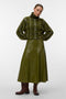 Front image of a model wearing the Dash hw coated skirt in green, by brand Vero moda