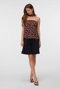 Front image of a model wearing the Elisa scarf tube top in chocolate, by brand Vero moda