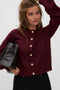 Front image of a model wearing the Hazel ls oneck cardigan in burgundy, by brand Vero moda