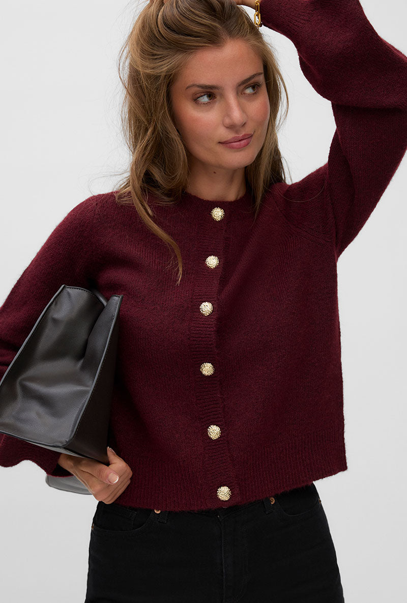 Front image of a model wearing Hazel ls oneck cardigan in burgundy, by brand Vero moda