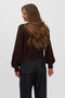 Back image of a model wearing the Hazel ls oneck cardigan in chocolate, by brand Vero moda