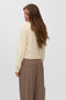 Back image of a model wearing the Hazel ls oneck cardigan in cream, by brand Vero moda