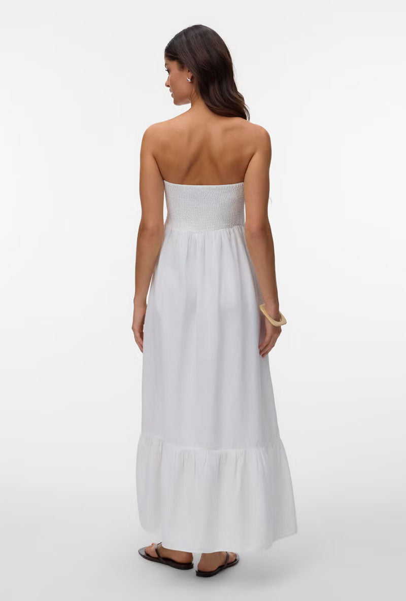 Back image of a model wearing Lisa bandeau ankle dress in off white, by brand Vero moda