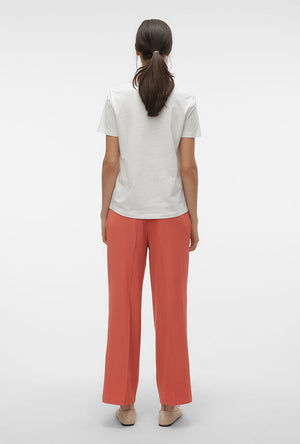 Back image of a model wearing the Philipa francis ss top in off white, by brand Vero moda