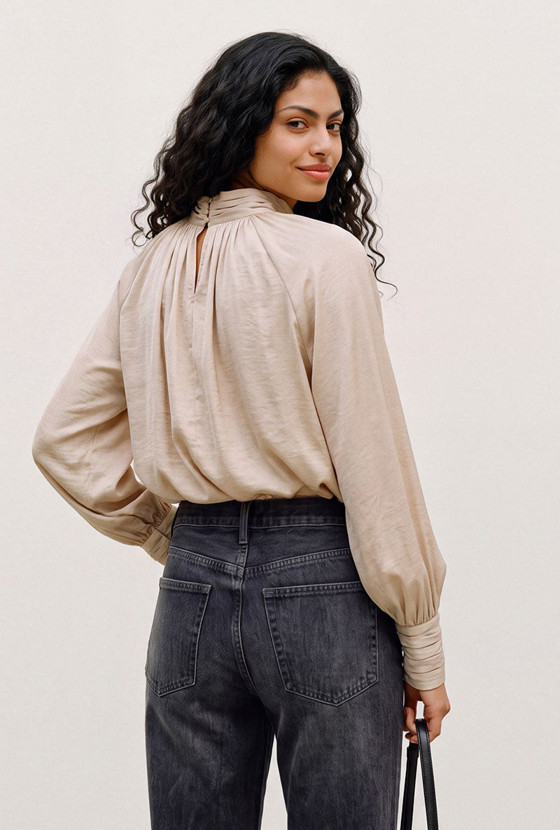 Back image of a model wearing Sunny ls top in cream, by brand Vero moda