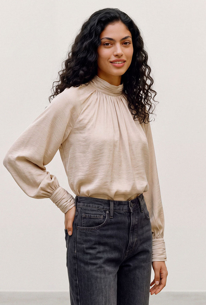 Front image of a model wearing Sunny ls top in cream, by brand Vero moda