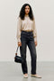 Front image of a model wearing the Sunny ls top in cream, by brand Vero moda